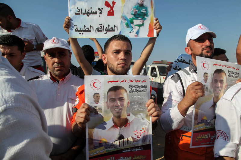 Gaza’s medics pay tribute to their colleague Muhammad al-Judaili, who was fatally wounded during the Great March of Return.  Ramez Haboub APA images